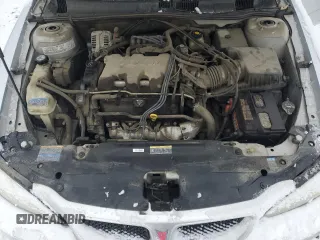 2004 Pontiac Grand Am SE1 with VIN 1G2NF52E24M543363, listed as a Copart auction lot 83989194 with 113,601 mi miles and Salvage Title. Bid and sale history available at carsss.com. Image 11.