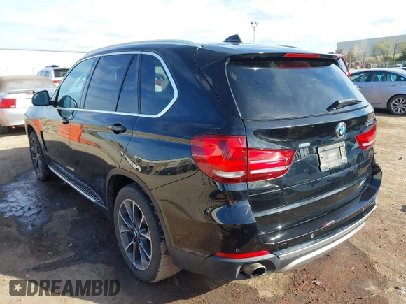 2016 BMW X5 xDrive35i with VIN 5UXKR0C54G0U11822, listed as a IAAI auction lot 41909821 with 149,460 mi miles. Bid and sale history available at carsss.com. Image 3.