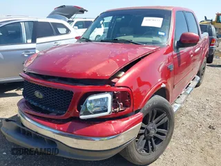 2002 Ford F-150 XLT with VIN 1FTRW07682KC33857, listed as a IAAI auction lot 41870137 with 185,480 mi miles. Bid and sale history available at carsss.com. Image 18.