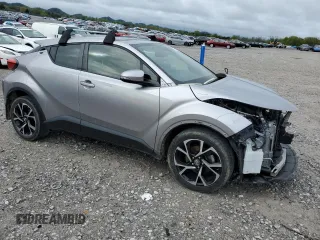 2019 Toyota C-HR XLE with VIN JTNKHMBX7K1048428, listed as a Copart auction lot 51943135 with 82,957 mi miles and Salvage Title. Bid and sale history available at carsss.com. Image 4.
