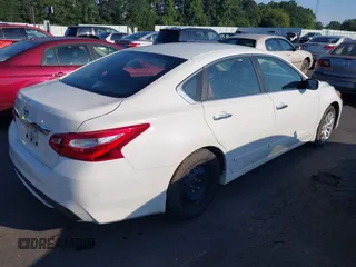 2016 Nissan Altima S with VIN 1N4AL3AP9GN355504, listed as a IAAI auction lot 42631887 with 122,957 mi miles and . Bid and sale history available at DreamBid. Image 4.