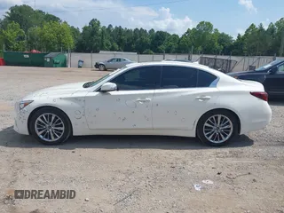 2018 Infiniti Q50 Luxe with VIN JN1EV7AP7JM352520, listed as a IAAI auction lot 42427317 with 73,717 mi miles and . Bid and sale history available at DreamBid. Image 14.