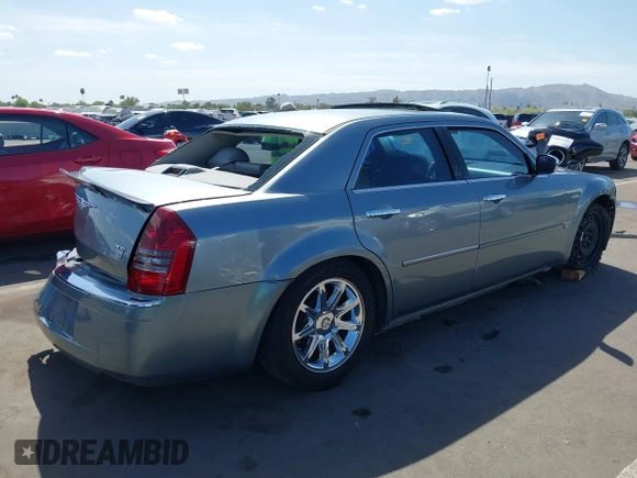 2006 Chrysler 300 C with VIN 2C3KA63H56H313967, listed as a IAAI auction lot 42056998 with 143,592 mi miles and . Bid and sale history available at carsss.com. Image 4.