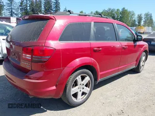 2010 Dodge Journey SXT with VIN 3D4PH5FV5AT135831, listed as a IAAI auction lot 42175106 with 164,030 mi miles and . Bid and sale history available at carsss.com. Image 4.
