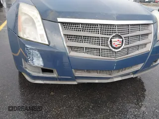 2009 Cadillac CTS AWD w/1SB with VIN 1G6DT57V190120218, listed as a IAAI auction lot 42105030 with 214,031 mi miles. Bid and sale history available at carsss.com. Image 6.