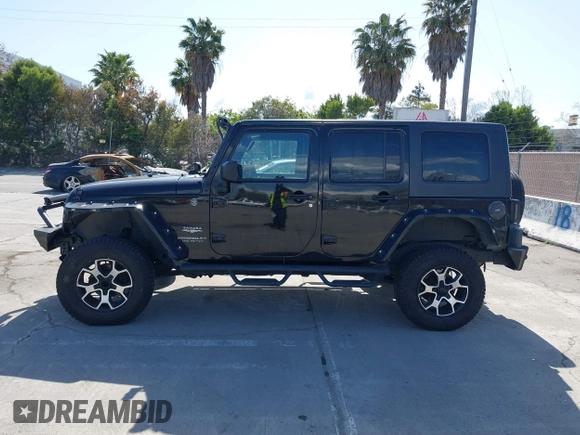 2008 Jeep Wrangler Unlimited Sahara with VIN 1J8GA59168L587554, listed as a IAAI auction lot 41963587 with 189,943 mi miles and . Bid and sale history available at DreamBid. Image 14.