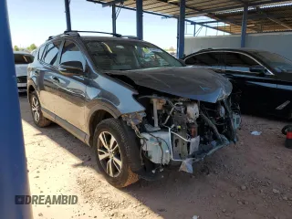 2018 Toyota RAV4 XLE with VIN JTMWFREV5JJ180198, listed as a Copart auction lot 52440575 with 43,707 mi miles and Salvage Title. Bid and sale history available at DreamBid. Image 4.