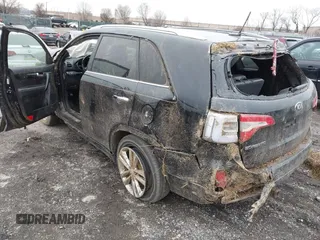 2014 Kia Sorento SX Limited with VIN 5XYKWDA70EG440053, listed as a IAAI auction lot 41565177 with 106,706 mi miles. Bid and sale history available at carsss.com. Image 3.
