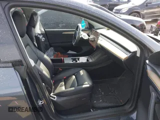 2022 Tesla Model Y Long Range z VIN 7SAYGDEE6NA013757, wystawiony jako IAAI lot #41364867 z przebiegiem 33 621 mil mil oraz . Historia ofert i sprzedaży dostępna na DreamBid. Obrazek 5.
