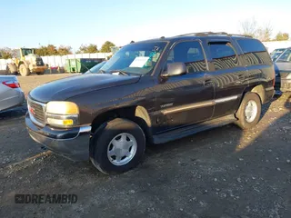 2003 GMC Yukon SLT with VIN 1GKEC13Z53R279530, listed as a IAAI auction lot 41451412 with 308,872 mi miles. Bid and sale history available at carsss.com. Image 2.