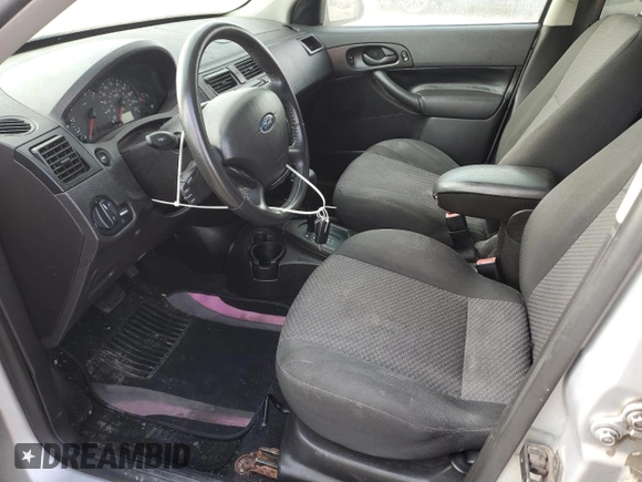 2007 Ford Focus S with VIN 1FAFP37N77W337626, listed as a Copart auction lot 70451294 with 174,068 mi miles and Salvage Title. Bid and sale history available at carsss.com. Image 7.