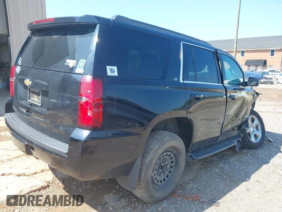 2019 Chevrolet Tahoe LT with VIN 1GNSKBKC1KR264324, listed as a IAAI auction lot 42474572 with 139,142 mi miles and . Bid and sale history available at DreamBid. Image 4.