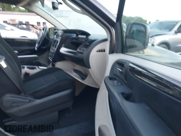 2012 Dodge Grand Caravan SXT with VIN 2C4RDGCG1CR141019, listed as a IAAI auction lot 42088541 with 148,931 mi miles and . Bid and sale history available at DreamBid. Image 5.