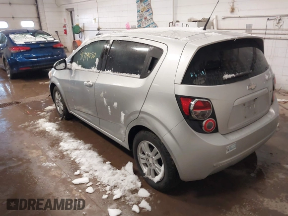 2014 Chevrolet Sonic LT with VIN 1G1JC6SB5E4234334, listed as a IAAI auction lot 41719050 with 118,755 mi miles. Bid and sale history available at carsss.com. Image 3.