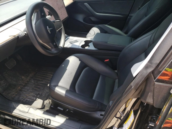 2023 Tesla Model 3 z VIN 5YJ3E1EA6PF578430, wystawiony jako Copart lot #56003665 z przebiegiem 17 930 mil mil oraz Szkoda całkowita • Salvage title. Historia ofert i sprzedaży dostępna na DreamBid. Obrazek 7.