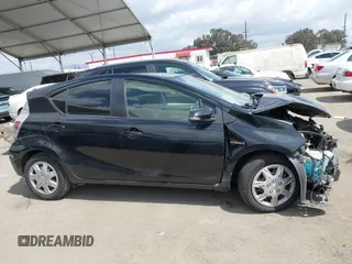 2012 Toyota Prius One z VIN JTDKDTB33C1501551, wystawiony jako IAAI lot #41912355 z przebiegiem 122 211 mil mil oraz . Historia ofert i sprzedaży dostępna na DreamBid. Obrazek 14.