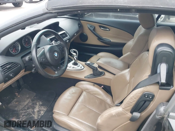 2007 BMW 6 Series M6 z VIN WBSEK93587CY78191, wystawiony jako IAAI lot #41703769 z przebiegiem Nie podano mil oraz . Historia ofert i sprzedaży dostępna na DreamBid. Obrazek 5.