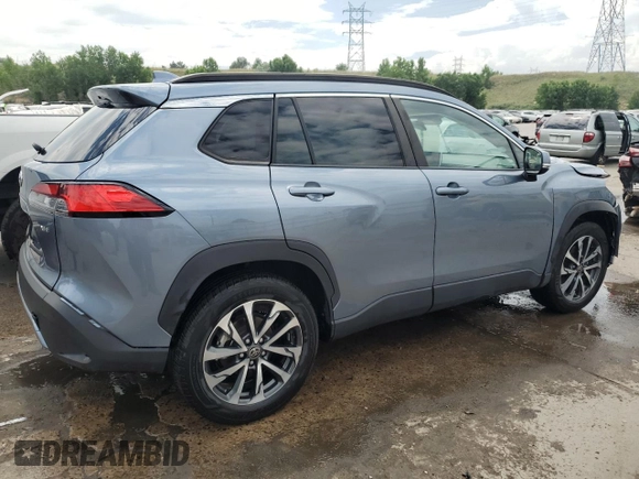 2023 Toyota Corolla Cross XLE with VIN 7MUDAAAG8PV055275, listed as a Copart auction lot 62363375 with 26,106 mi miles and Salvage title. Bid and sale history available at DreamBid. Image 3.