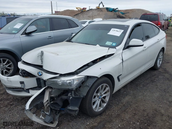 2014 BMW 3 Series Gran Turismo 328i xDrive with VIN WBA3X5C5XED559713, listed as a IAAI auction lot 42078622 with 68,233 mi miles. Bid and sale history available at carsss.com. Image 2.