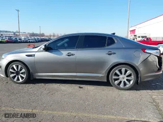 2013 Kia Optima SX w/Limited Pkg with VIN 5XXGR4A69DG190125, listed as a IAAI auction lot 41424498 with 134,056 mi miles. Bid and sale history available at carsss.com. Image 14.