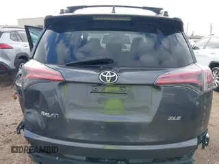 2018 Toyota RAV4 XLE with VIN 2T3WFREV4JW417555, listed as a IAAI auction lot 41092589 with 93,788 mi miles and . Bid and sale history available at DreamBid. Image 17.