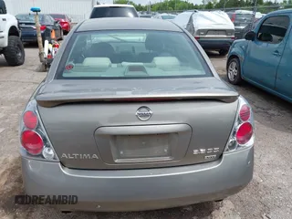 2006 Nissan Altima SE z VIN 1N4BL11D46N322200, wystawiony jako IAAI lot #42131619 z przebiegiem 248 538 mil mil oraz . Historia ofert i sprzedaży dostępna na DreamBid. Obrazek 16.