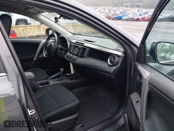 2018 Toyota RAV4 LE with VIN 2T3BFREV8JW850391, listed as a IAAI auction lot 42487413 with 66,866 mi miles and . Bid and sale history available at DreamBid. Image 5.