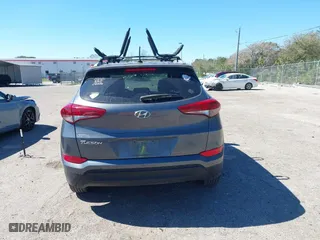 2017 Hyundai Tucson SE Plus with VIN KM8J33A45HU452928, listed as a IAAI auction lot 41601229 with 114,949 mi miles. Bid and sale history available at carsss.com. Image 16.