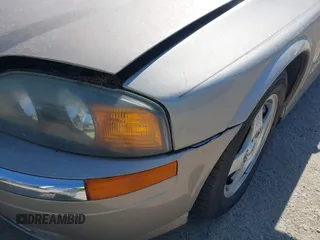 2000 Lincoln LS z VIN 1LNHM86S9YY852483, wystawiony jako IAAI lot #42292141 z przebiegiem 126 347 mil mil oraz . Historia ofert i sprzedaży dostępna na DreamBid. Obrazek 6.