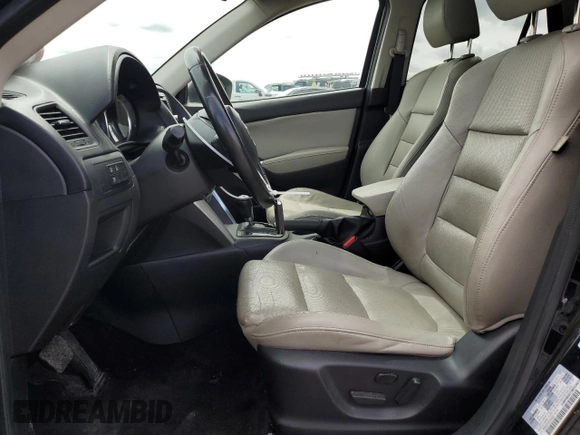 2014 Mazda CX-5 Grand Touring with VIN JM3KE4DY3E0304908, listed as a Copart auction lot 53873655 with 144,382 mi miles and Salvage Title. Bid and sale history available at DreamBid. Image 7.