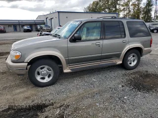 2000 Ford Explorer Eddie Bauer z VIN 1FMZU74E3YZB45594, wystawiony jako Copart lot #79420944 z przebiegiem 185 791 mil mil oraz Czysty tytuł • Clean title. Historia ofert i sprzedaży dostępna na DreamBid. Obrazek 1.