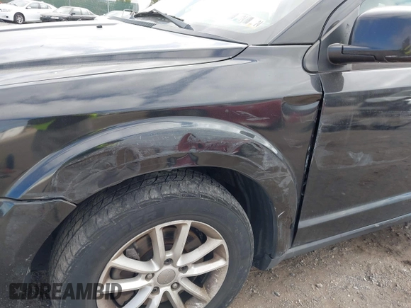 2013 Dodge Journey SXT with VIN 3C4PDDBG7DT553130, listed as a IAAI auction lot 40570369 with Not Provided miles and . Bid and sale history available at DreamBid. Image 14.