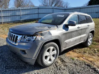 2012 Jeep Grand Cherokee Laredo with VIN 1C4RJFAG7CC299315, listed as a Copart auction lot 46174745 with 152,256 mi miles and Salvage Title. Bid and sale history available at carsss.com. Image 1.