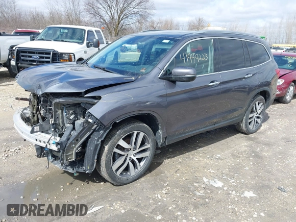 2017 Honda Pilot Touring with VIN 5FNYF6H92HB036406, listed as a IAAI auction lot 41949223 with 147,462 mi miles. Bid and sale history available at carsss.com. Image 17.