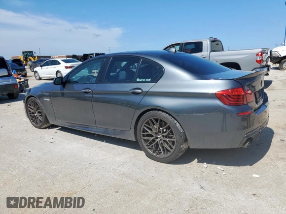 2015 BMW 5 Series 550i with VIN WBAKN9C59FD961491, listed as a Copart auction lot 60208745 with 70,241 mi miles and Salvage title. Bid and sale history available at DreamBid. Image 2.