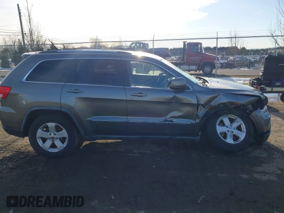 2011 Jeep Grand Cherokee 70th Anniversary with VIN 1J4RR4GT6BC715848, listed as a IAAI auction lot 41562152 with 119,910 mi miles. Bid and sale history available at carsss.com. Image 13.