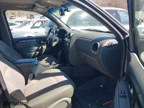 2004 GMC Envoy SLE with VIN 1GKDS13S242370041, listed as a IAAI auction lot 41698413 with 158,160 mi miles. Bid and sale history available at carsss.com. Image 5.