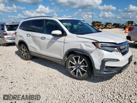 2020 Honda Pilot Touring 7-Passenger with VIN 5FNYF6H69LB018905, listed as a Copart auction lot 61209685 with 61,637 mi miles and Salvage title. Bid and sale history available at DreamBid. Image 4.
