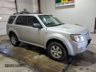 2008 Mercury Mariner with VIN 4M2CU81Z18KJ45619, listed as a Copart auction lot 52230575 with 255,957 mi miles and Salvage title. Bid and sale history available at DreamBid. Image 4.