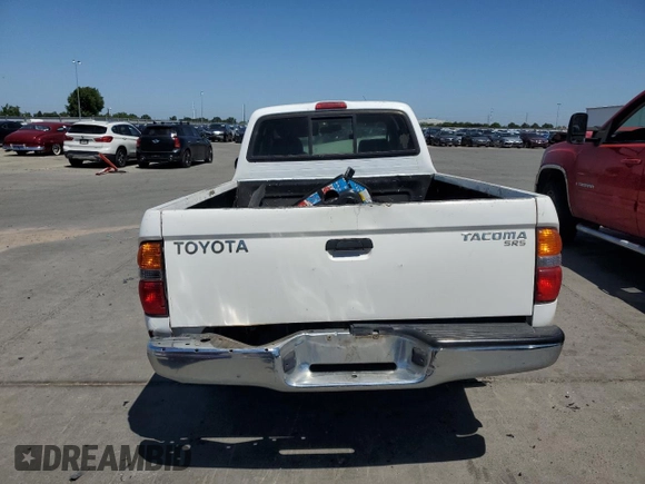 2004 Toyota Tacoma z VIN 5TEVL52N14Z401940, wystawiony jako Copart lot #55257905 z przebiegiem 288 990 mil mil oraz Szkoda całkowita • Salvage title. Historia ofert i sprzedaży dostępna na DreamBid. Obrazek 6.