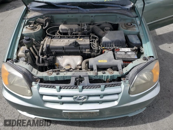2003 Hyundai Accent GL with VIN KMHCG35C13U277732, listed as a Copart auction lot 72276634 with 135,176 mi miles and Salvage Title. Bid and sale history available at carsss.com. Image 11.