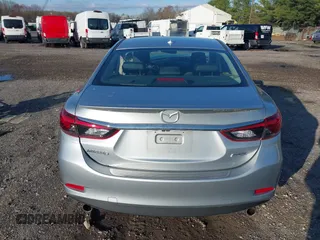 2017 Mazda 6 Grand Touring with VIN JM1GL1W50H1132261, listed as a IAAI auction lot 41930610 with 54,431 mi miles and . Bid and sale history available at DreamBid. Image 16.