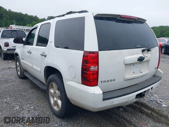 2007 Chevrolet Tahoe LT with VIN 1GNFC13007R415013, listed as a IAAI auction lot 42370633 with 302,992 mi miles and . Bid and sale history available at DreamBid. Image 3.
