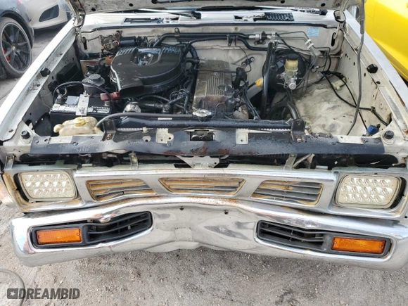 1996 Nissan Trucks 2WD XE with VIN 1N6SD11S9TC381222, listed as a Copart auction lot 76088224 with 215,333 mi miles and Salvage Title. Bid and sale history available at carsss.com. Image 11.