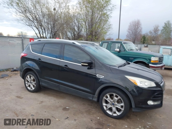 2015 Ford Escape Titanium with VIN 1FMCU9J96FUA27221, listed as a IAAI auction lot 41925276 with 180,758 mi miles and . Bid and sale history available at carsss.com. Image 1.