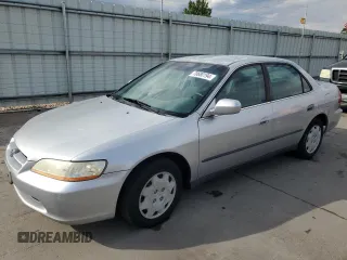2000 Honda Accord LX z VIN JHMCG5548YC032463, wystawiony jako Copart lot #70680194 z przebiegiem 221 995 mil mil oraz Szkoda całkowita • Salvage title. Historia ofert i sprzedaży dostępna na DreamBid. Obrazek 1.