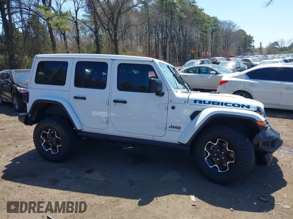 2023 Jeep Wrangler Rubicon with VIN 1C4JJXR68PW584303, listed as a IAAI auction lot 42049098 with 29,565 mi miles and . Bid and sale history available at DreamBid. Image 13.