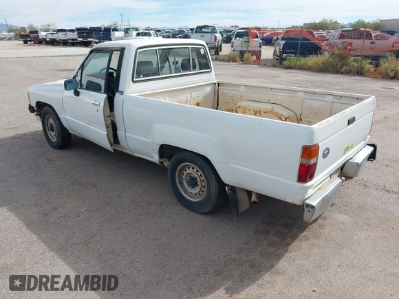 1991 Toyota Pickup DX z VIN JT4RN81P8M5123864, wystawiony jako IAAI lot #38084991 z przebiegiem 319 627 mil mil oraz . Historia ofert i sprzedaży dostępna na DreamBid. Obrazek 3.