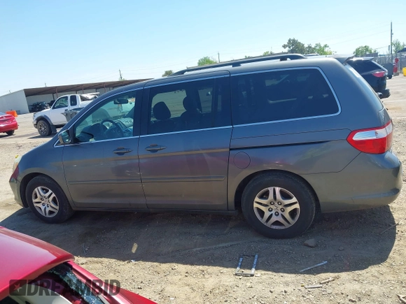 2007 Honda Odyssey EX-L z VIN 5FNRL38797B137595, wystawiony jako IAAI lot #42002233 z przebiegiem 192 296 mil mil oraz . Historia ofert i sprzedaży dostępna na DreamBid. Obrazek 14.