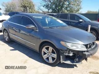 2014 Volkswagen CC Sport with VIN WVWBP7AN7EE533531, listed as a IAAI auction lot 41607620 with 117,529 mi miles and . Bid and sale history available at DreamBid. Image 1.
